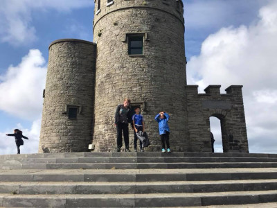 Standing in front of a castle | Mission Adventures: Ireland